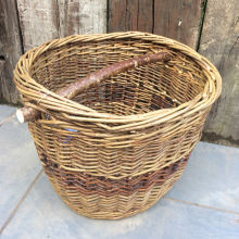 FOR SALE: &pound;50<br />Traditional weave basket with contemporary wooden handle. 30cm H x 40cm W